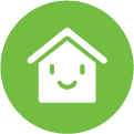 Smiling white cartoon house in a  light green circle