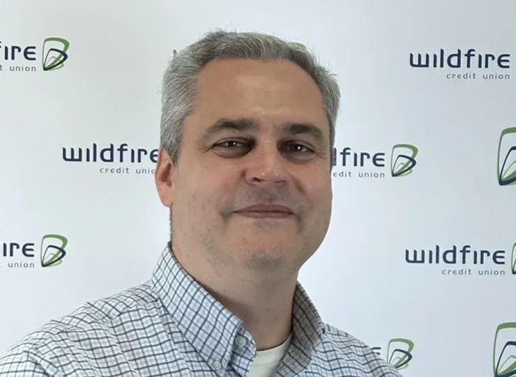 Headshot portrait of employee Troy Del Valle.