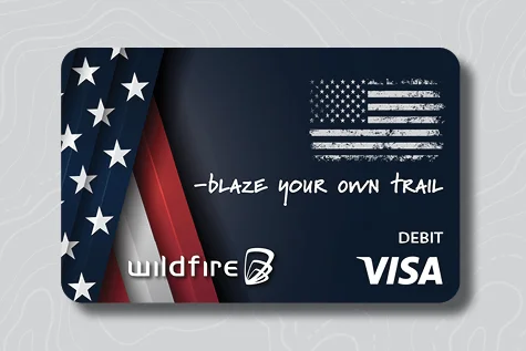 Debit card with United States Flag on a dark blue patriotic bankground.