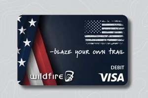 Debit card with United States Flag on a dark blue patriotic bankground.