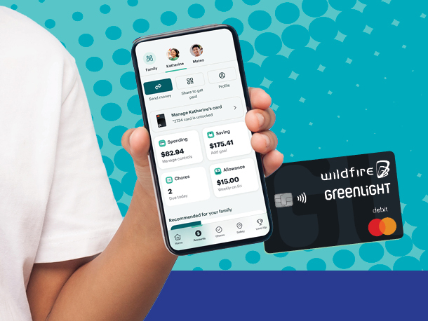 Greenlight Landing Page Graphic Person holding a cell phone with greenlight app open and co-branded debit card