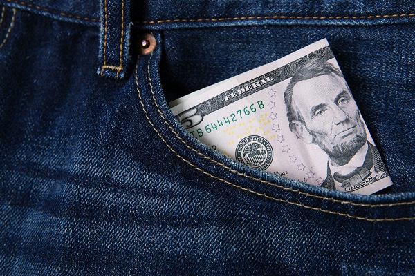 Jean Day Community Five dollar bill in jean pocket