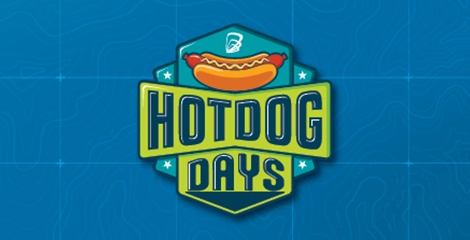 Hot Dog day logo over blue background