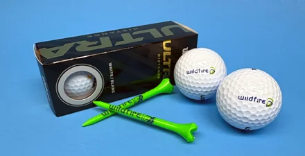 Ultra box of Wildfire branded golf balls and tees.