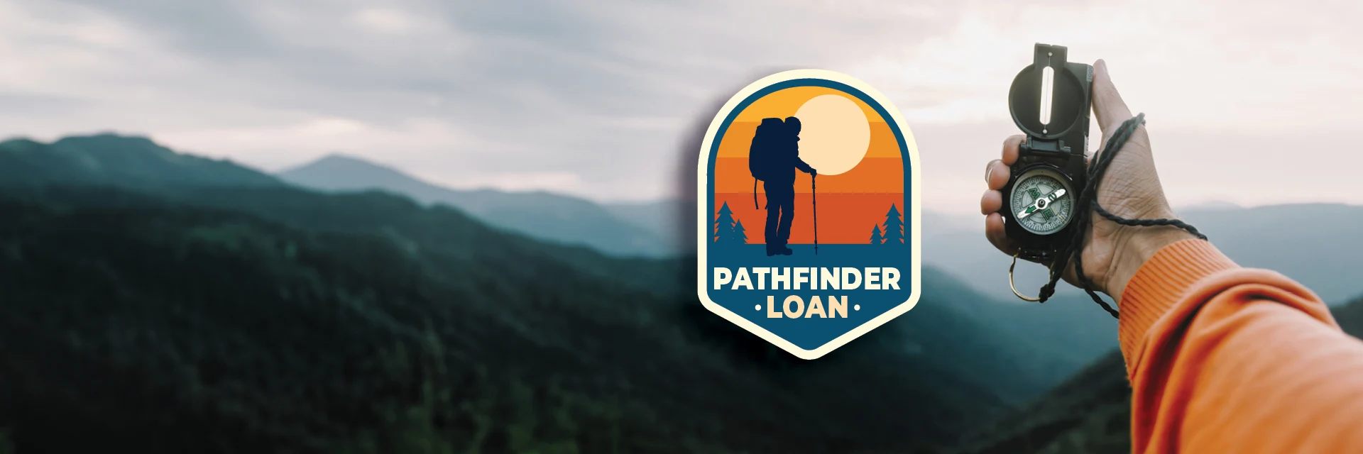 Pathfinder Loan badge and trail compass