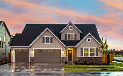 Brown and Gray Painted House in Front of Road