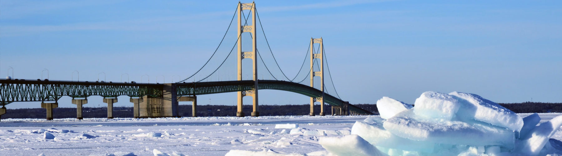 Mackinac Bridge in Winter during the day Mackinac Bridge in Winter during the day