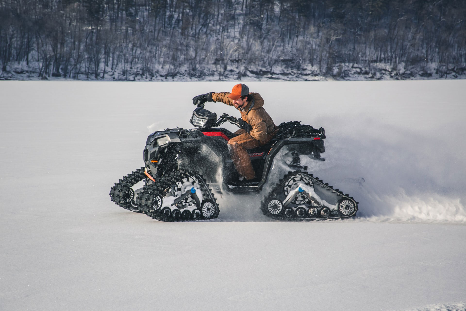 Man-riding-on-snow-atv