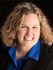 Headshot of Carrie Robbins.